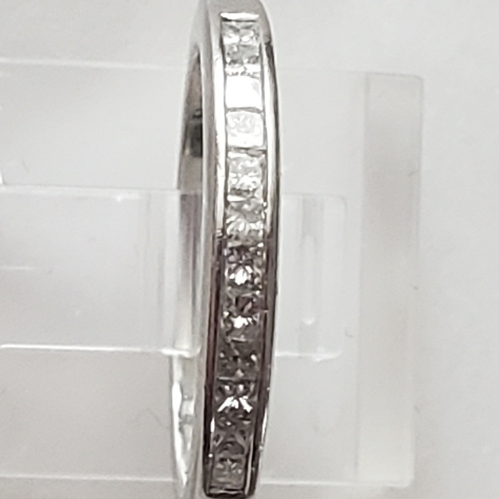 Platinum princess cut diamond band